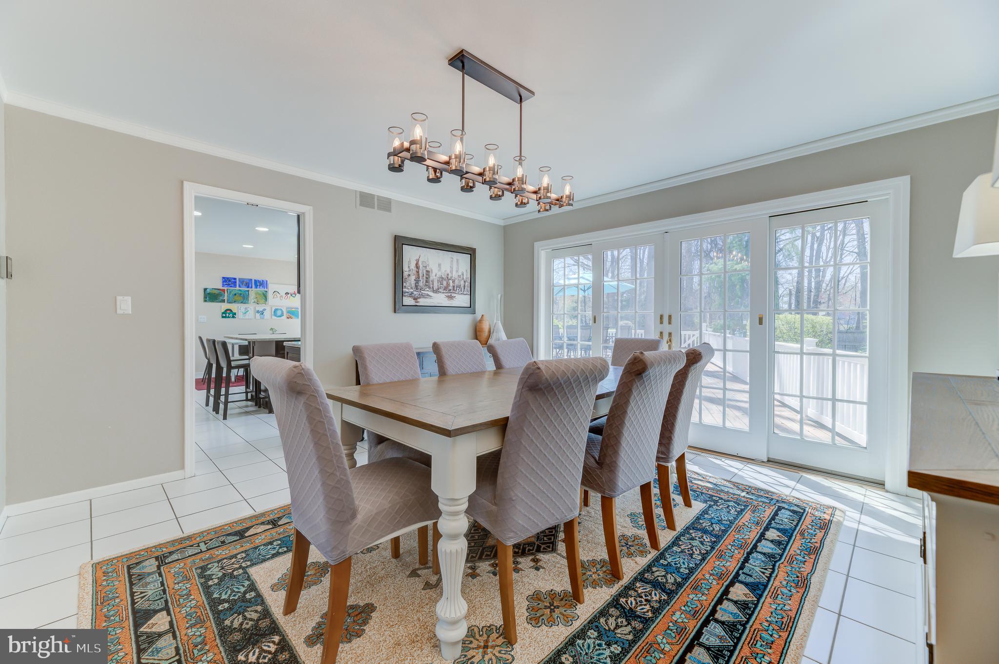 4 Hawk Drive Princeton Junction, NJ 08550 - Photo 15 of 45 a view of a dining room with furniture a rug and wooden floor