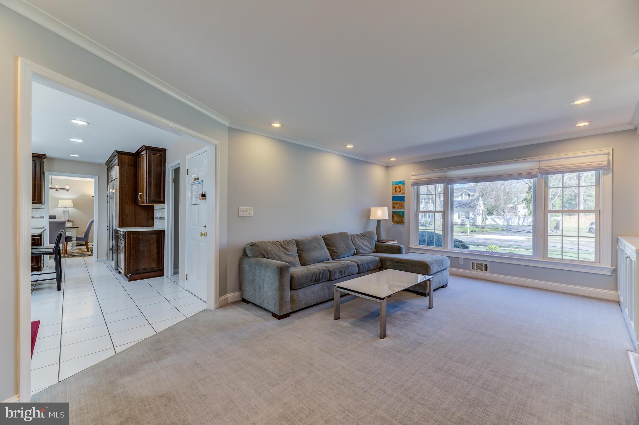 4 Hawk Drive Princeton Junction, NJ 08550 - Photo 16 of 45 a living room with furniture and large windows