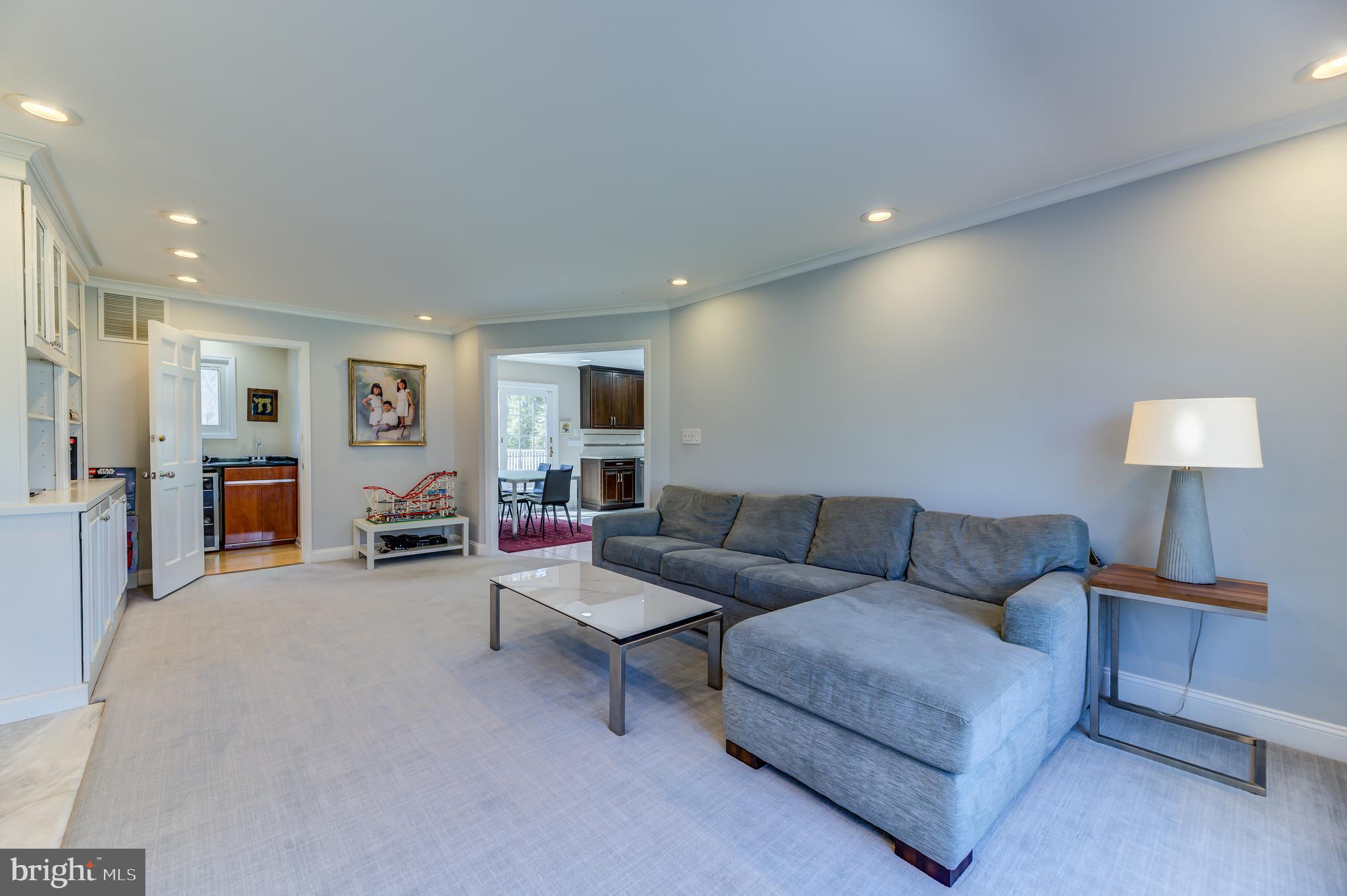 4 Hawk Drive Princeton Junction, NJ 08550 - Photo 17 of 45 a living room with furniture and a flat screen tv