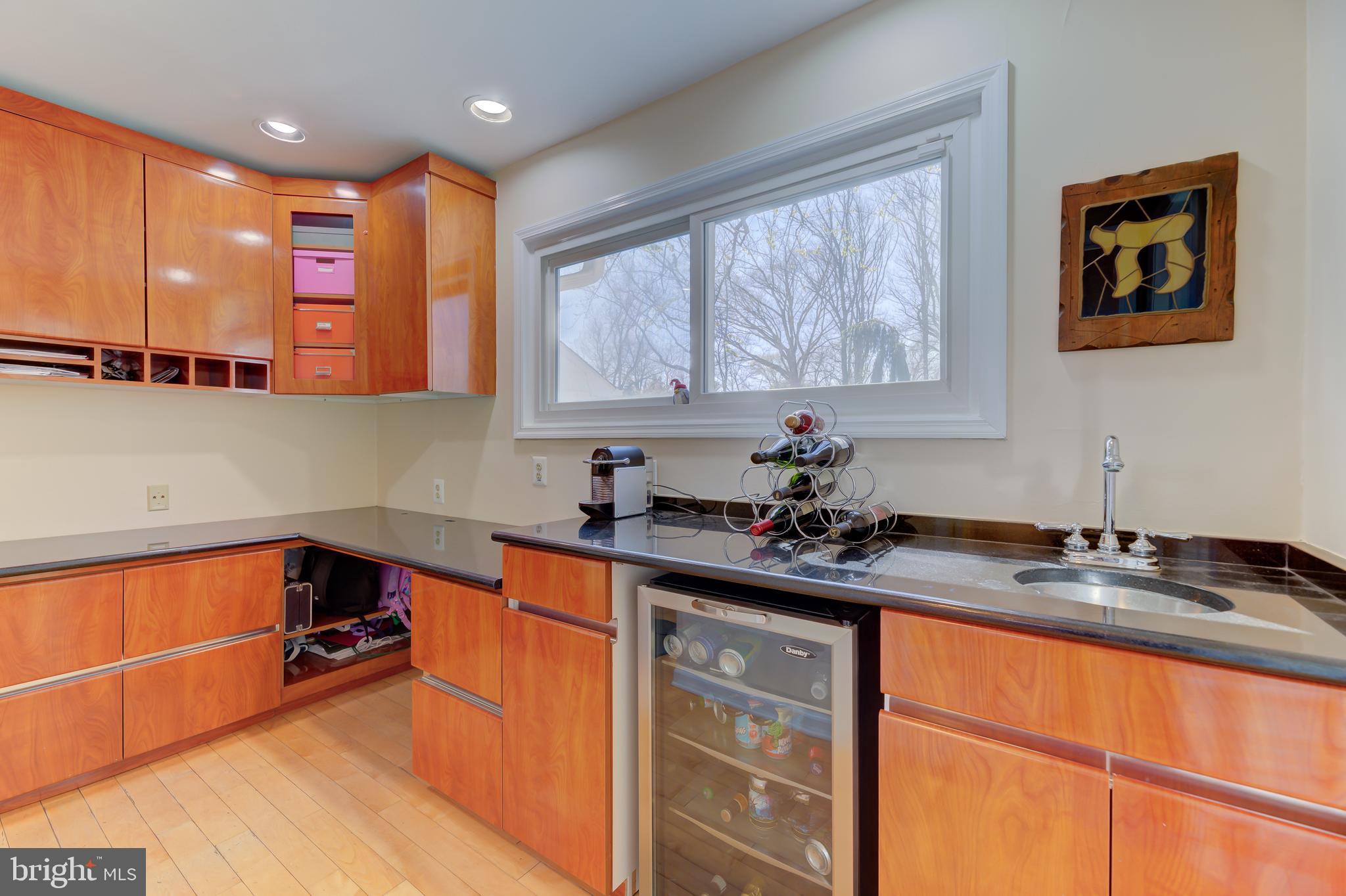4 Hawk Drive Princeton Junction, NJ 08550 - Photo 18 of 45 a kitchen with stainless steel appliances a sink stove and cabinets