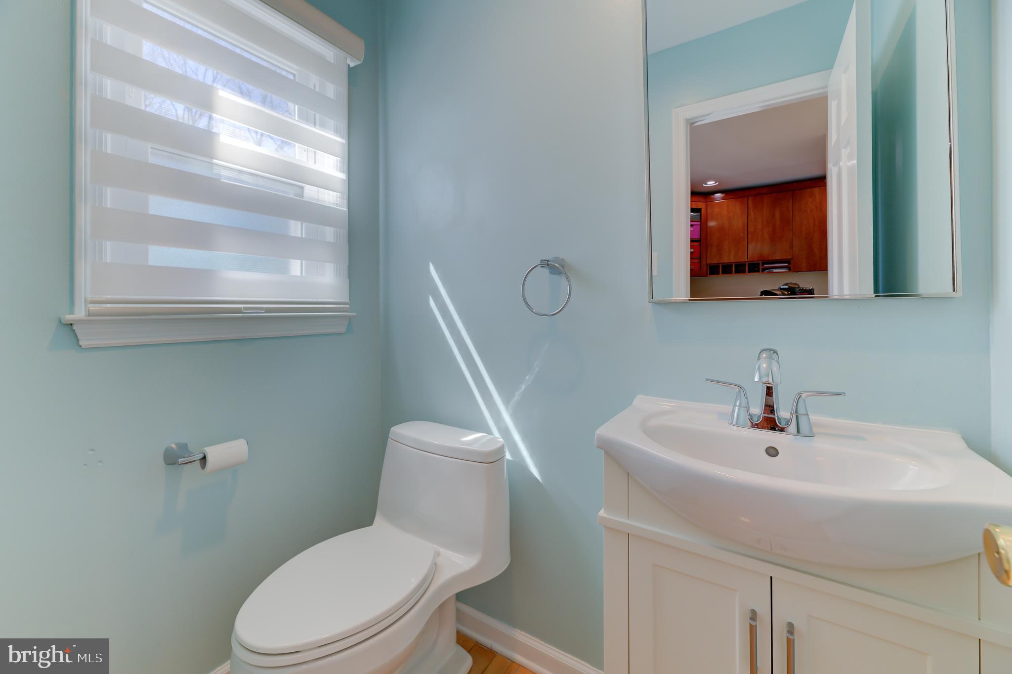 4 Hawk Drive Princeton Junction, NJ 08550 - Photo 20 of 45 a bathroom with a toilet a sink and mirror