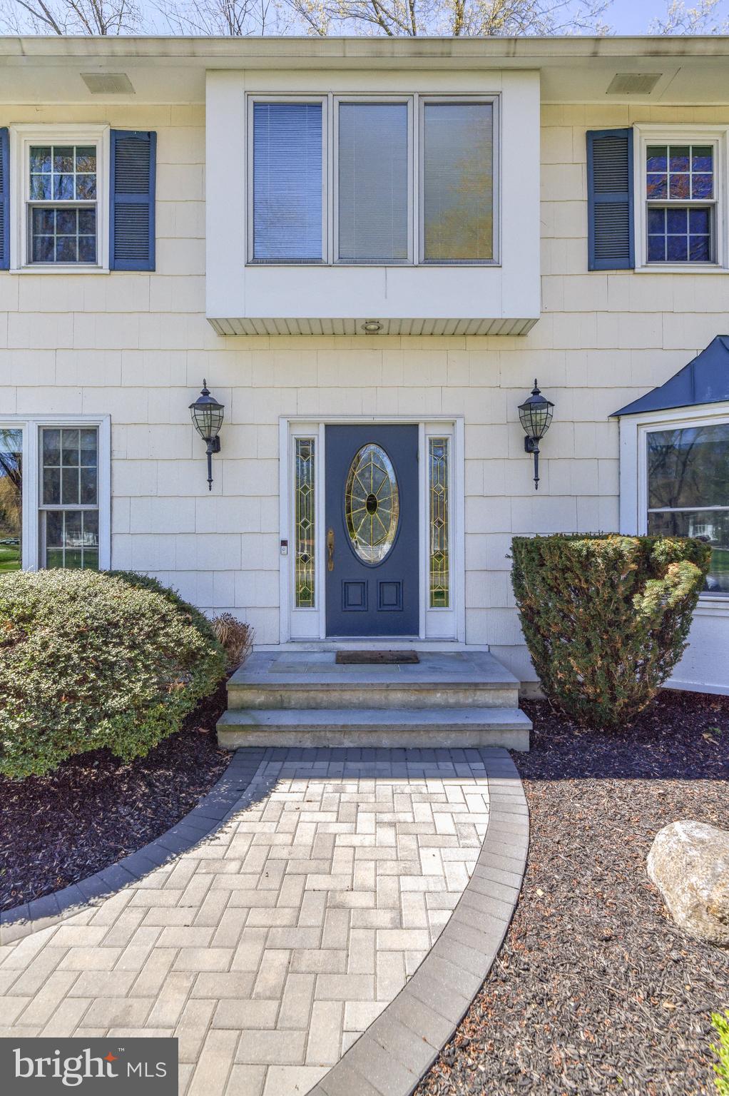 4 Hawk Drive Princeton Junction, NJ 08550 - Photo 2 of 45 a view of a brick house with potted plants