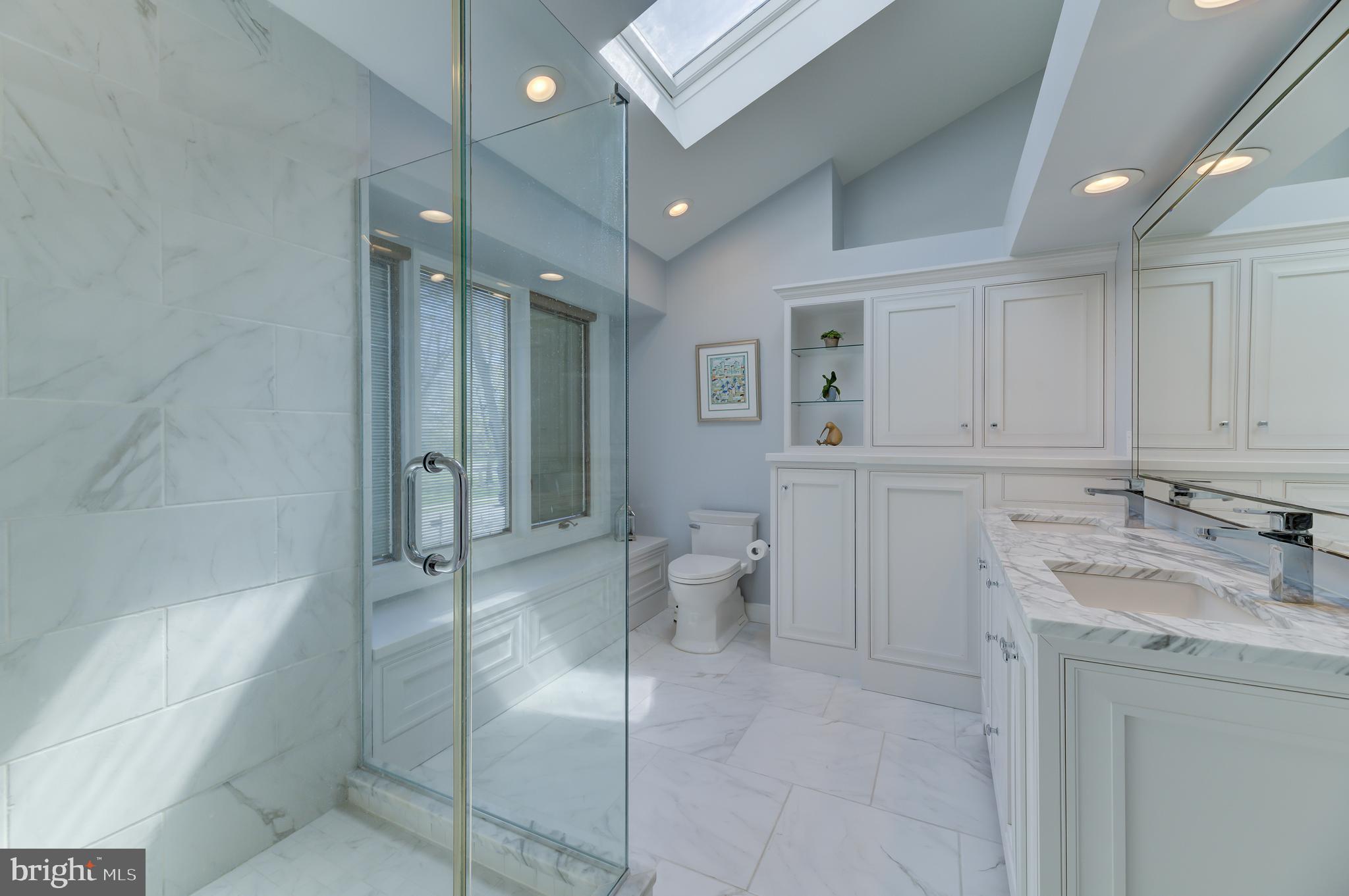 4 Hawk Drive Princeton Junction, NJ 08550 - Photo 27 of 45 a bathroom with a granite countertop sink mirror and bathtub