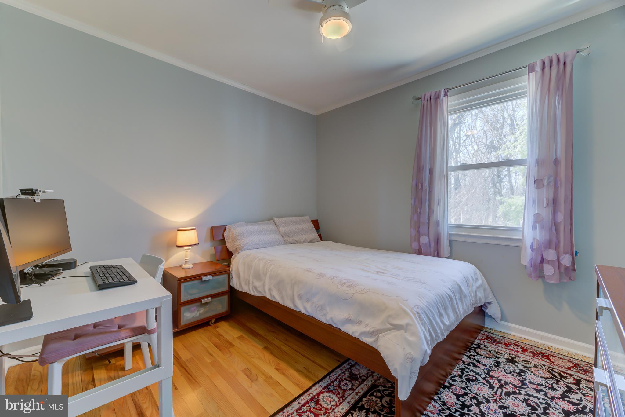 4 Hawk Drive Princeton Junction, NJ 08550 - Photo 30 of 45 a bedroom with a bed bookshelf and a window