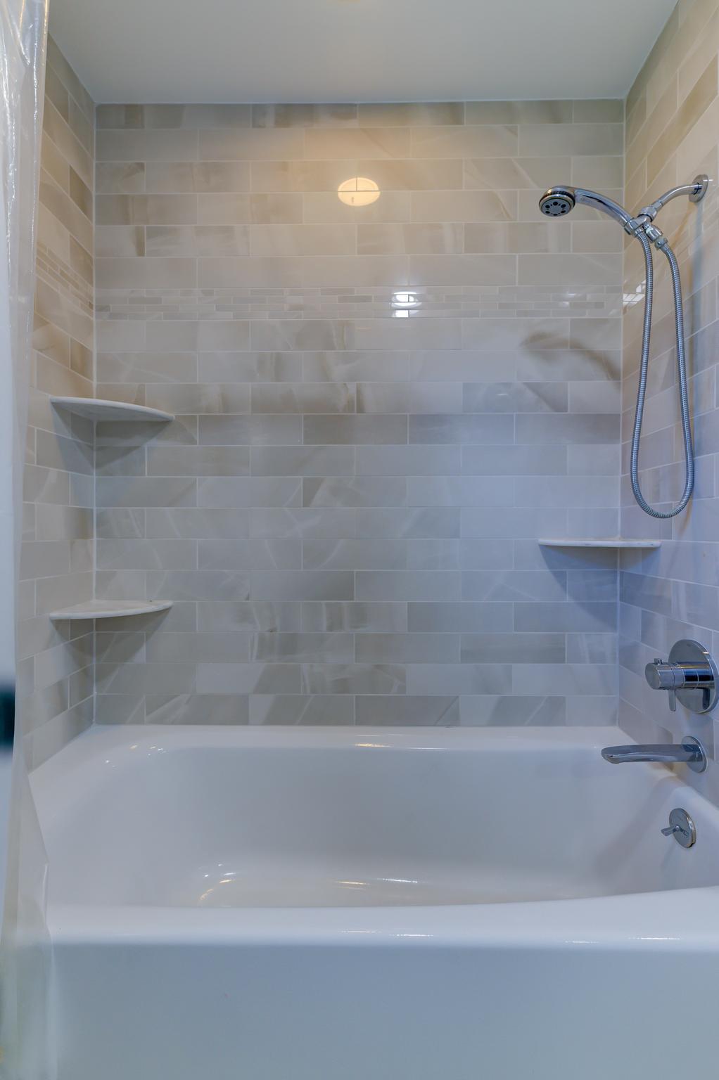 4 Hawk Drive Princeton Junction, NJ 08550 - Photo 34 of 45 a close view of a bathtub in bathroom