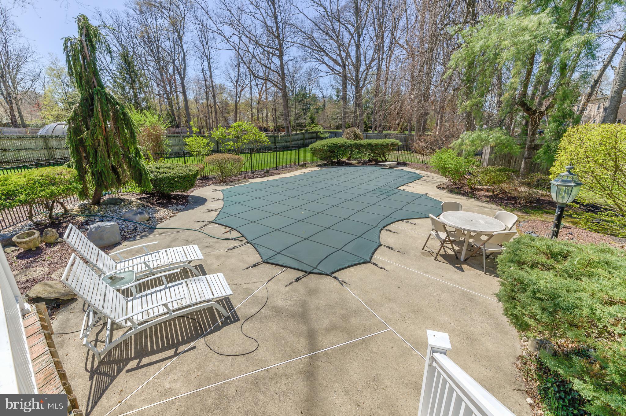 4 Hawk Drive Princeton Junction, NJ 08550 - Photo 44 of 45 a view of backyard with swimming pool and outdoor seating