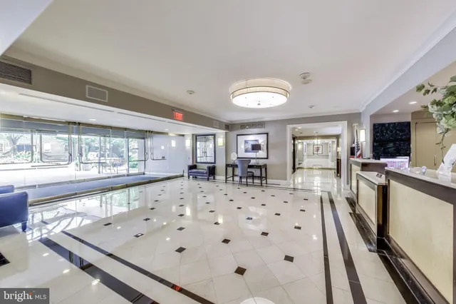 a bedroom with a bed and a cabinets