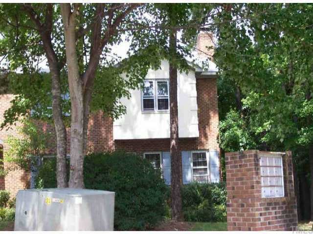 6155 Bushmills Street Raleigh, NC 27613 - Photo 1 of 1 a house that has tree in front of it