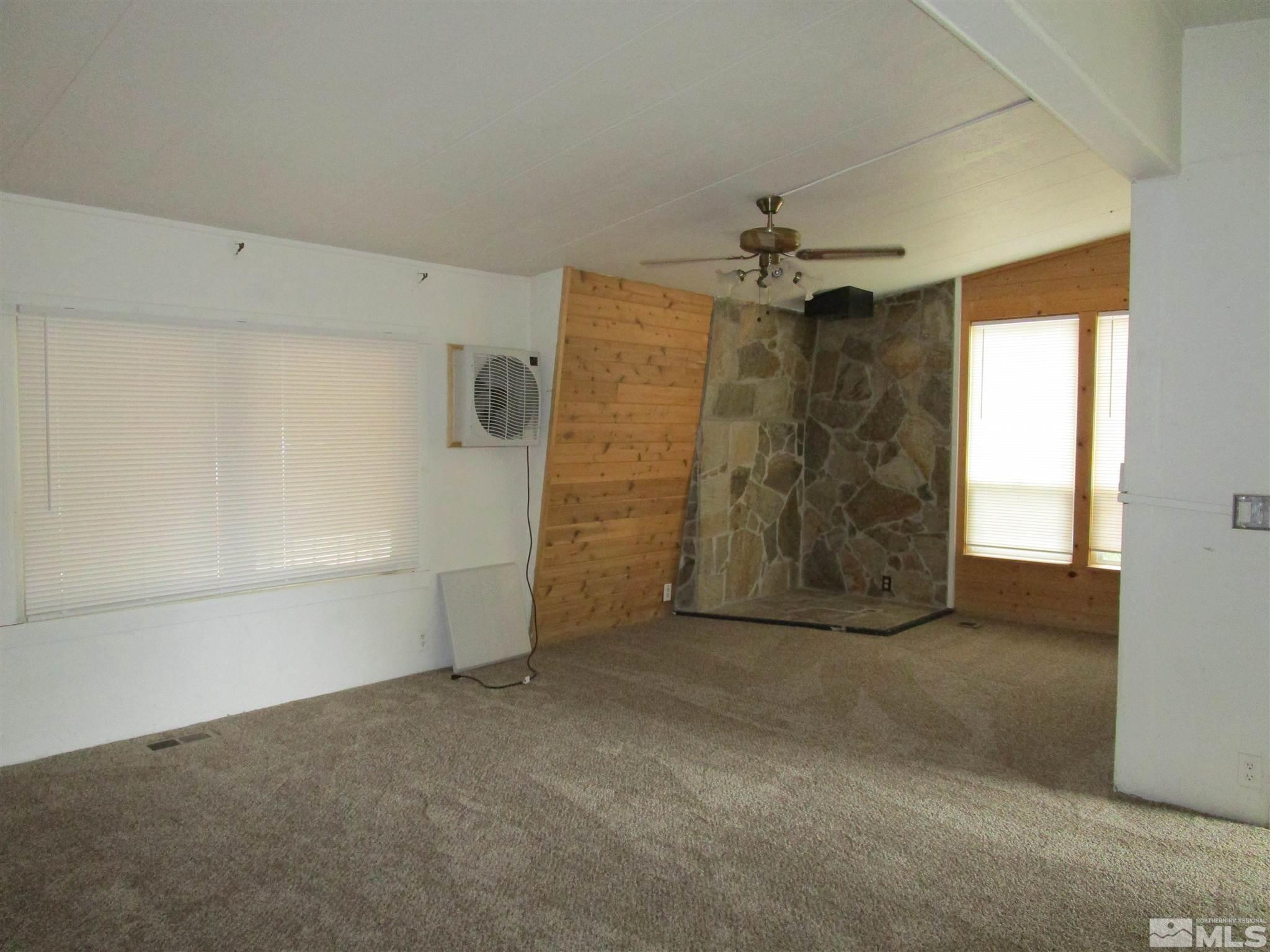 15025 Vega Street Reno, NV 89521 - Photo 8 of 24 a view of an empty room with a window