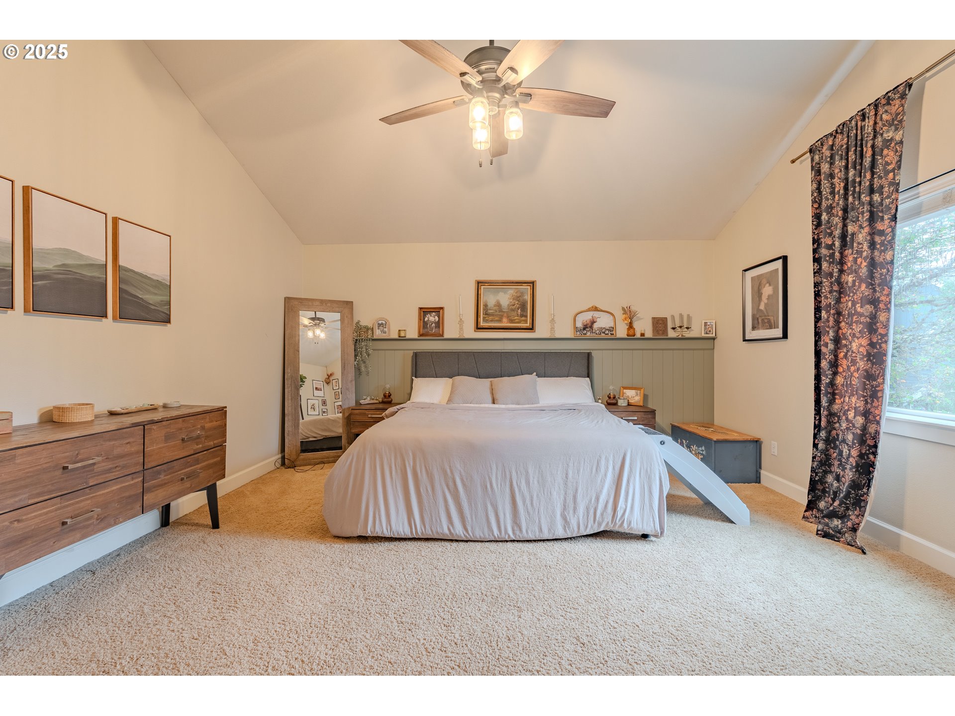 3505 Southeast 197th Avenue Camas, WA 98607 - Photo 18 of 30 a bedroom with a bed and a chandelier