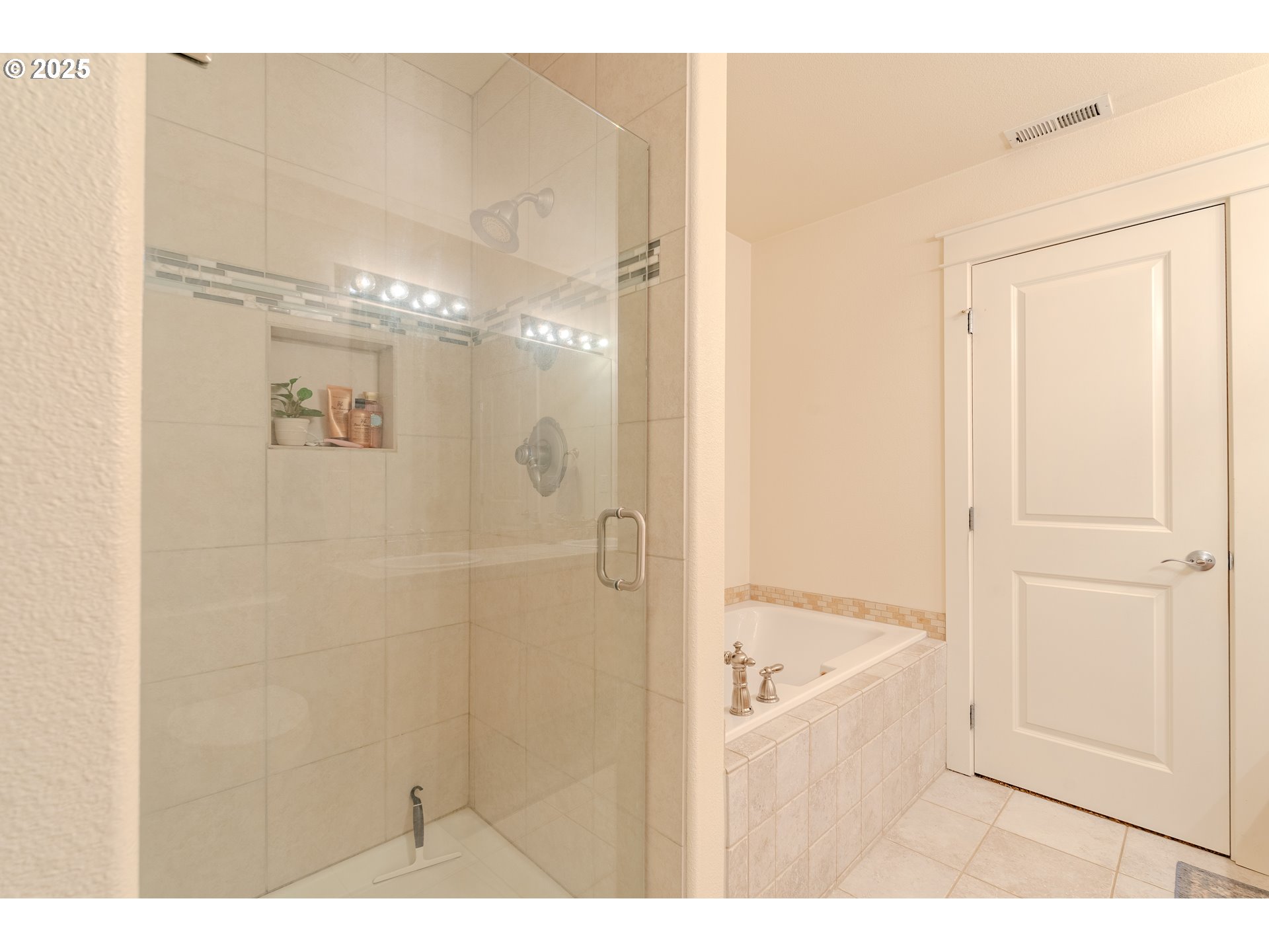 3505 Southeast 197th Avenue Camas, WA 98607 - Photo 22 of 30 a bathroom with a bathtub and a shower