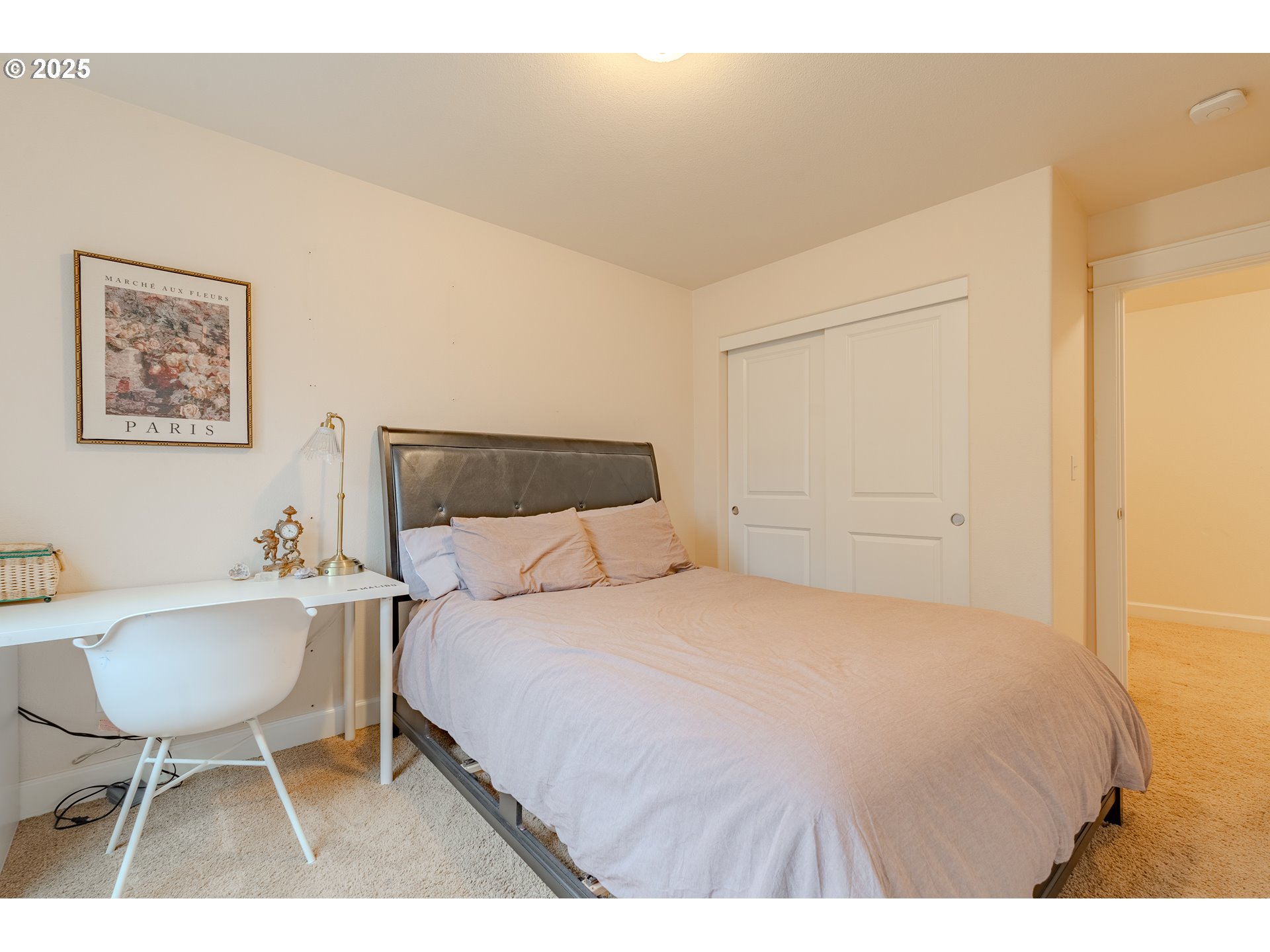 3505 Southeast 197th Avenue Camas, WA 98607 - Photo 25 of 30 a bedroom with a bed and a chair with the wooden floor