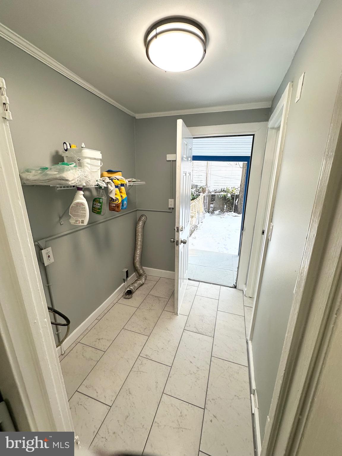 331 Tyler Street Trenton, NJ 08609 - Photo 23 of 49 a room with table and mirror