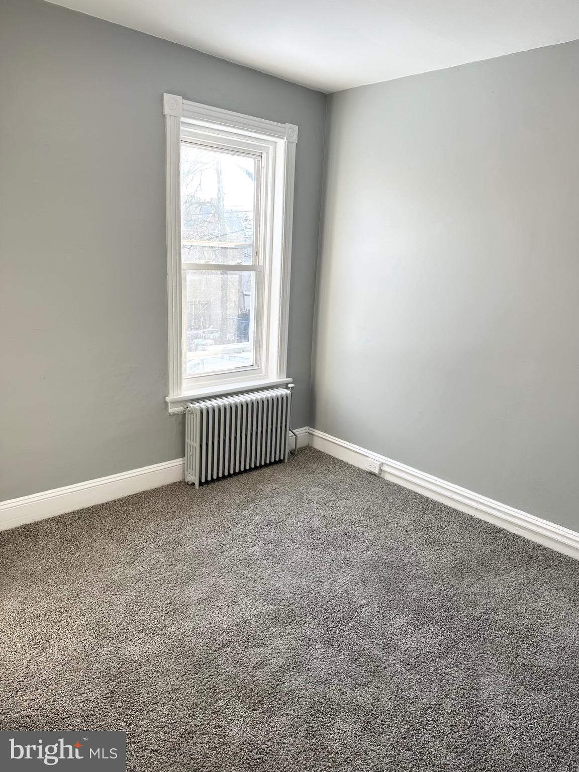 331 Tyler Street Trenton, NJ 08609 - Photo 25 of 49 an empty room with a window