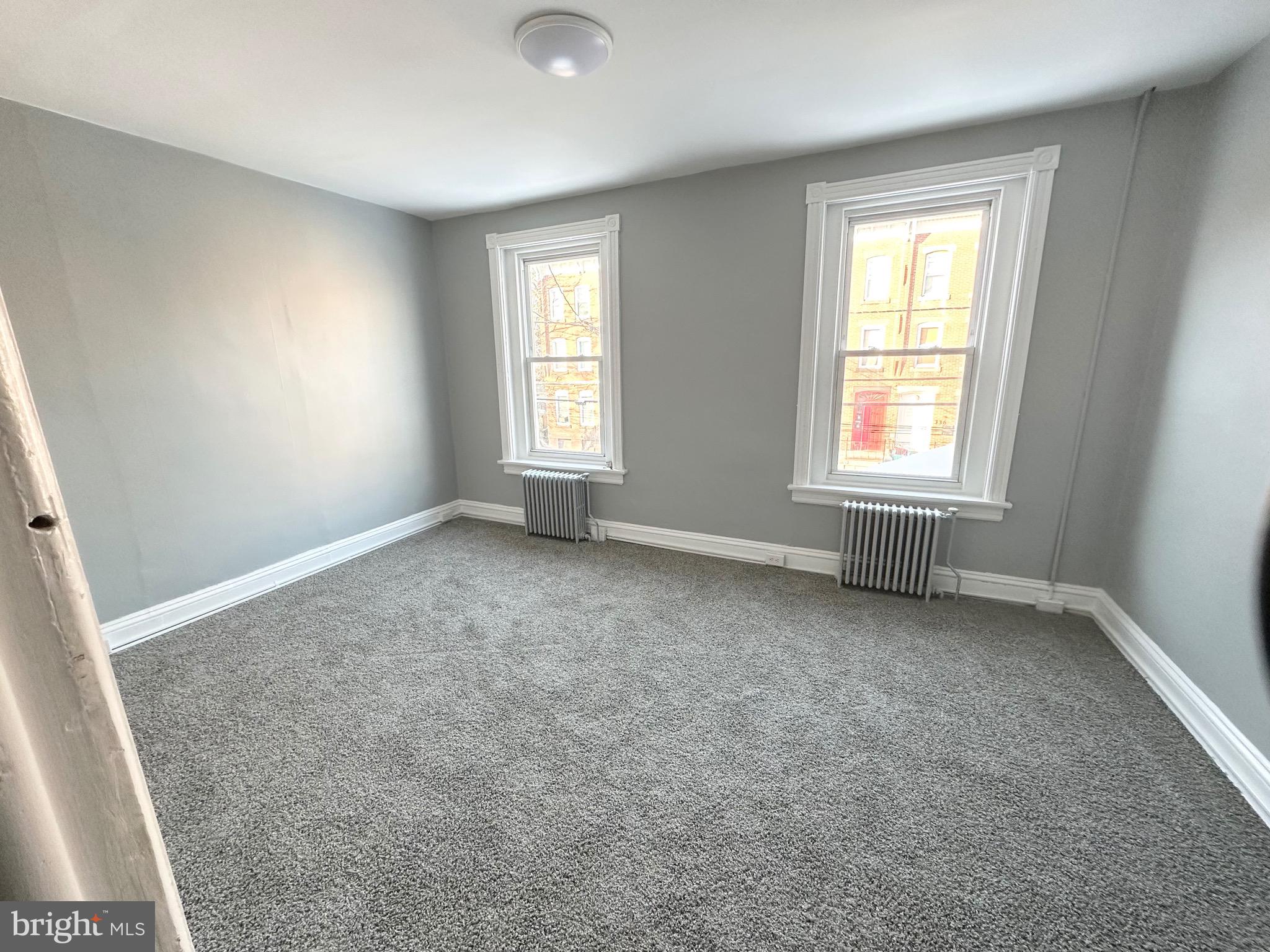 331 Tyler Street Trenton, NJ 08609 - Photo 33 of 49 an empty room with windows