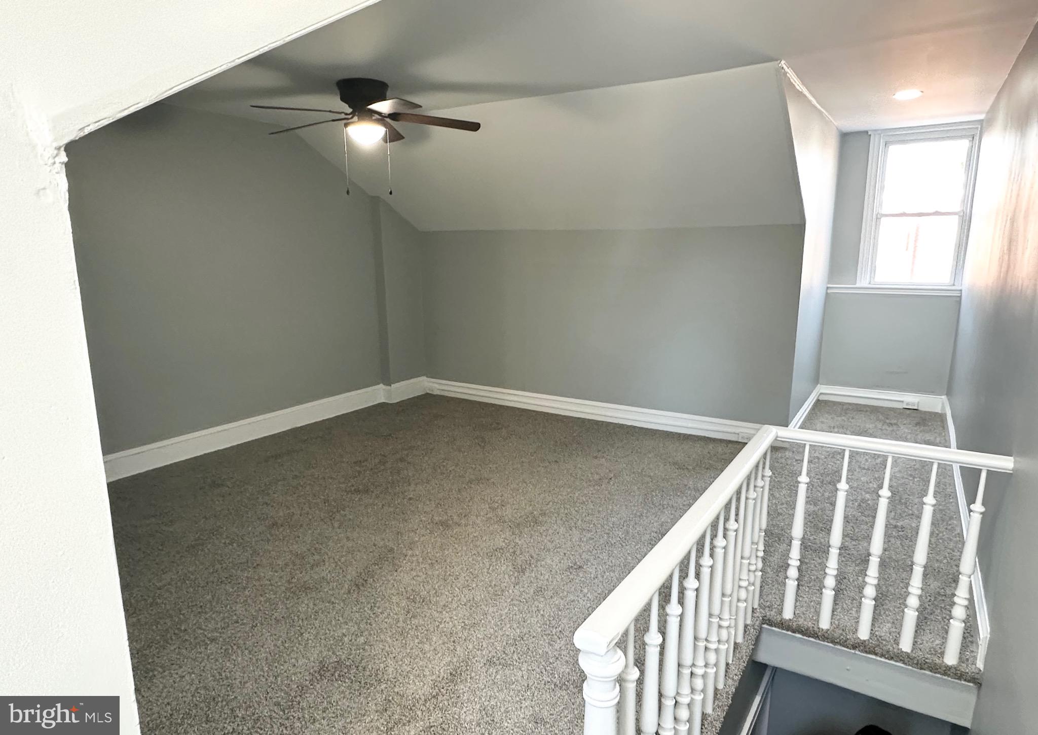 331 Tyler Street Trenton, NJ 08609 - Photo 34 of 49 wooden floor in an empty room with a window