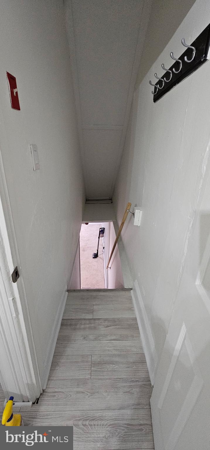 331 Tyler Street Trenton, NJ 08609 - Photo 37 of 49 a view of a hallway with wooden floor