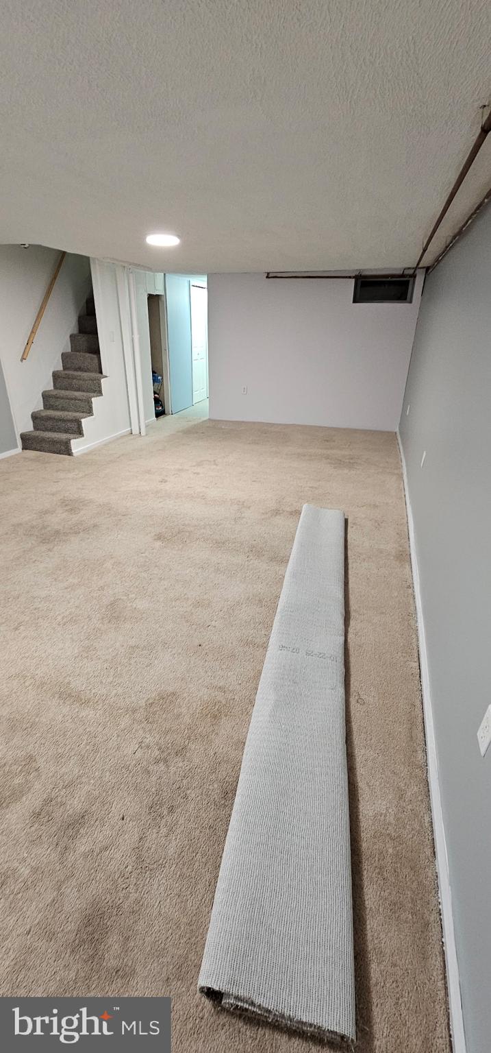 331 Tyler Street Trenton, NJ 08609 - Photo 40 of 49 a view of a room with wooden floor