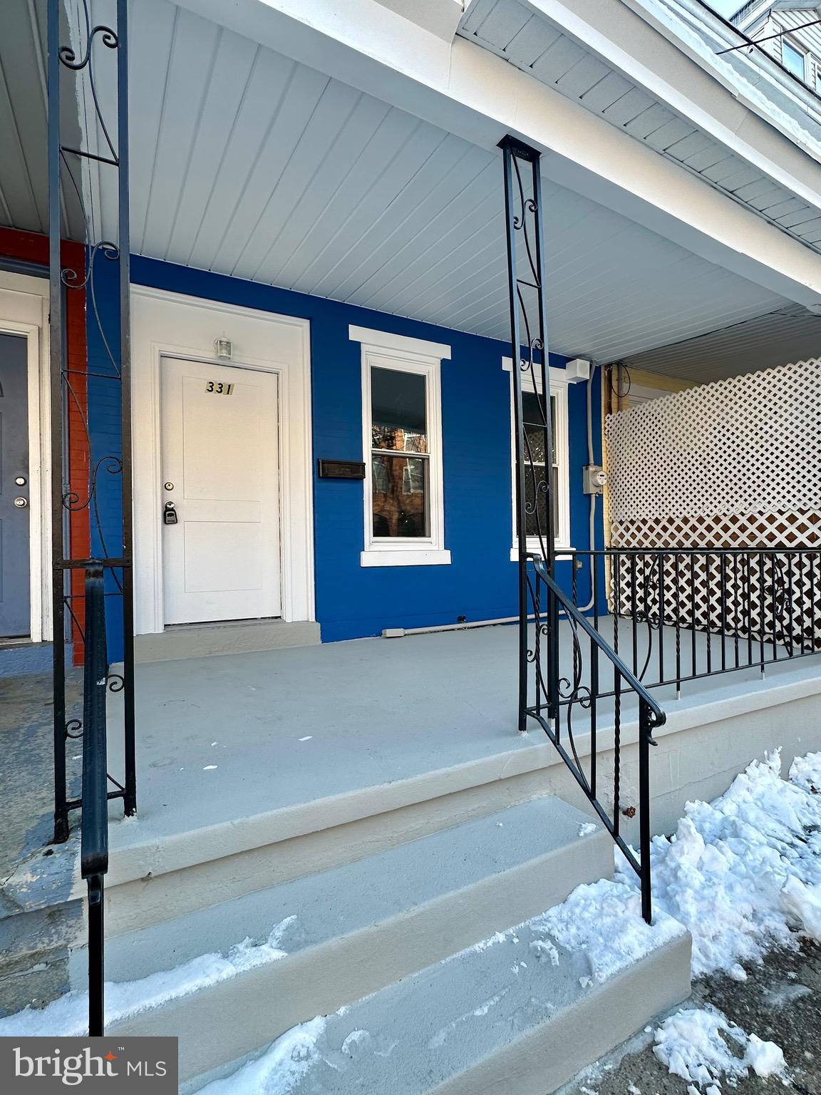 331 Tyler Street Trenton, NJ 08609 - Photo 4 of 49 a front view of a house with a porch