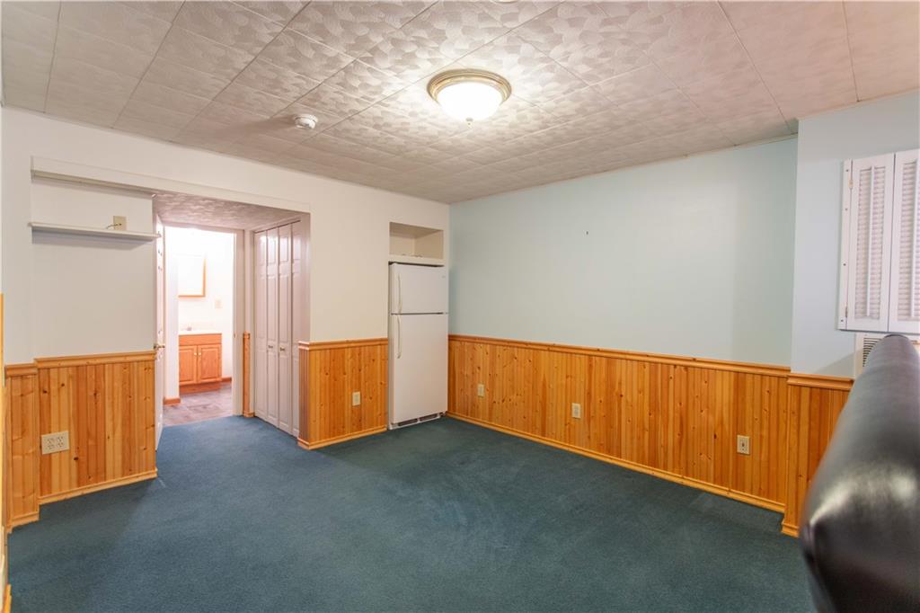 128 Moffett Run Road Aliquippa, PA 15001 - Photo 36 of 48 a view of an empty room with wooden floor and windows