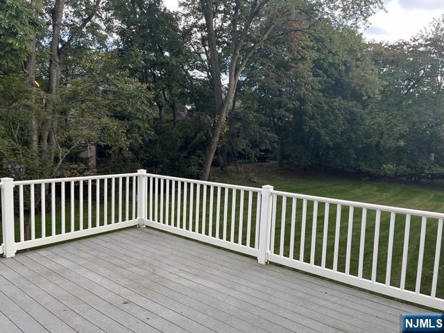 300 Harristown Road, Unit 1 Glen Rock, NJ 07452 - Photo 13 of 20 a view of balcony with wooden floor