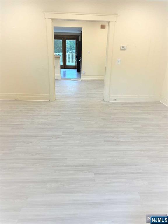 300 Harristown Road, Unit 1 Glen Rock, NJ 07452 - Photo 2 of 20 a view of an empty room and window