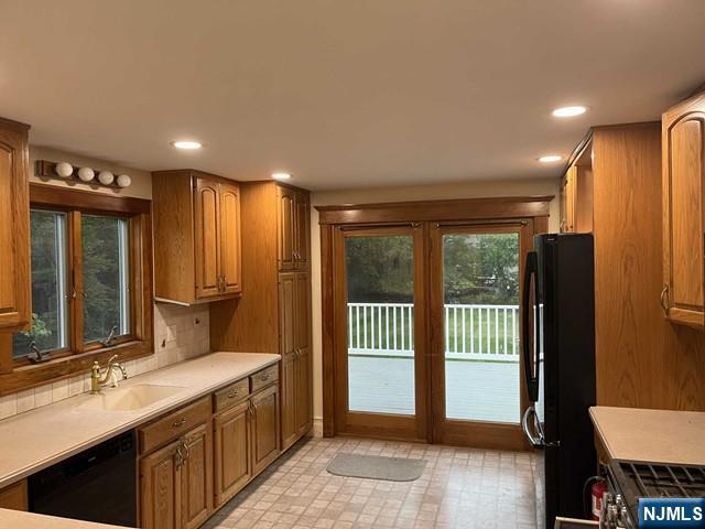 300 Harristown Road, Unit 1 Glen Rock, NJ 07452 - Photo 6 of 20 a bathroom with a double vanity sink and a mirror