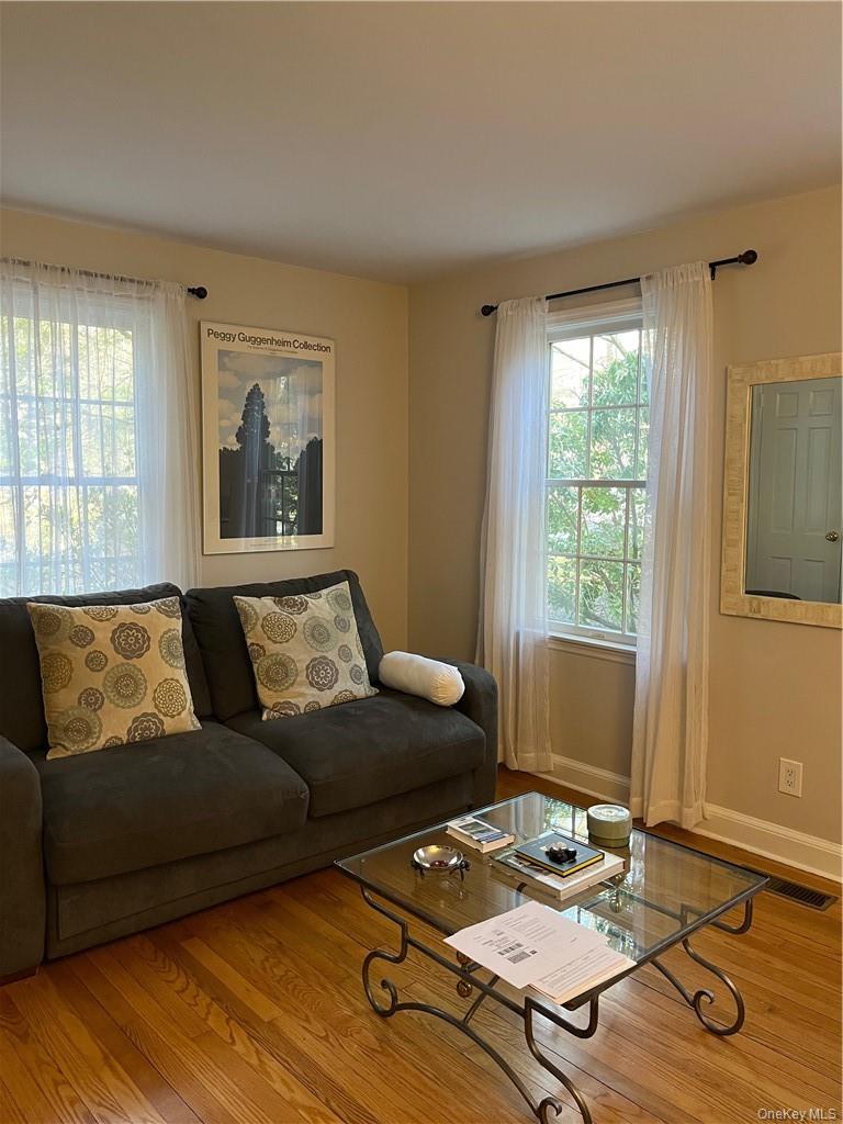 49 Commodore Road Chappaqua, NY 10514 - Photo 24 of 26 a living room with furniture and a window