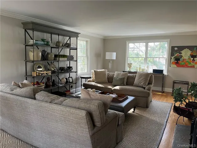 a kitchen with stainless steel appliances granite countertop a refrigerator a stove a sink and a microwave