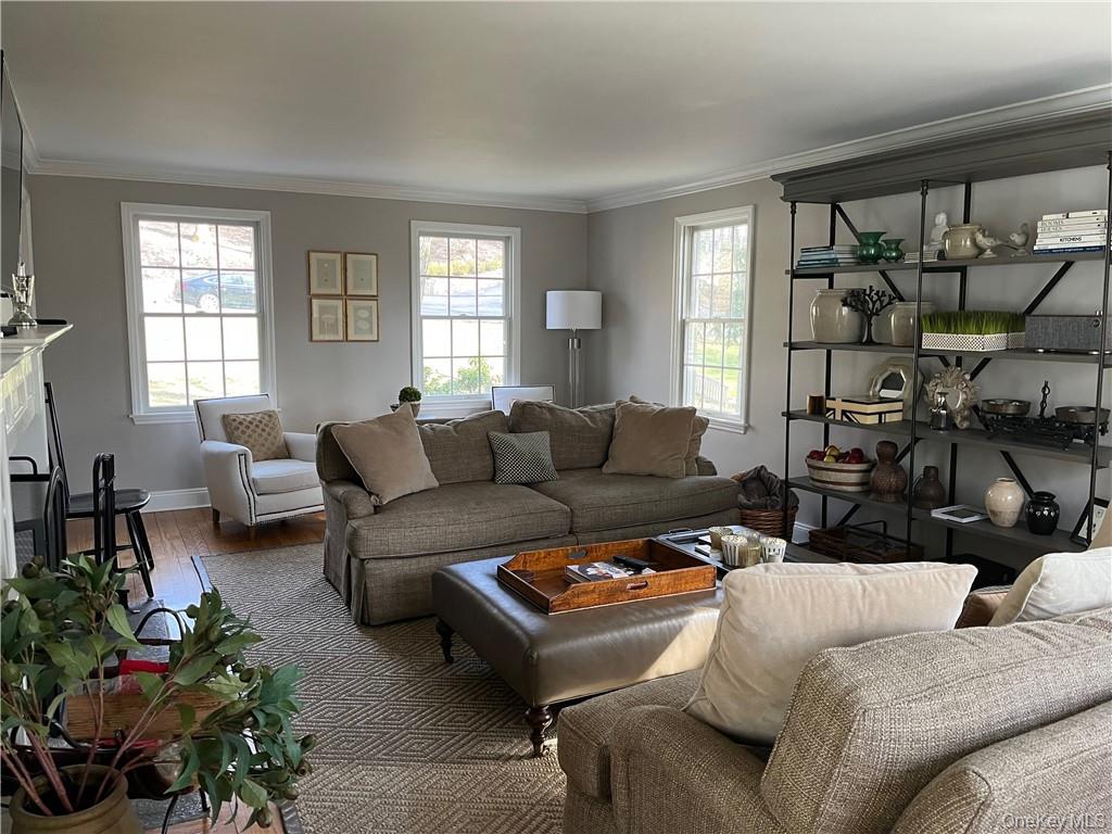 49 Commodore Road Chappaqua, NY 10514 - Photo 6 of 26 a living room with furniture and a window