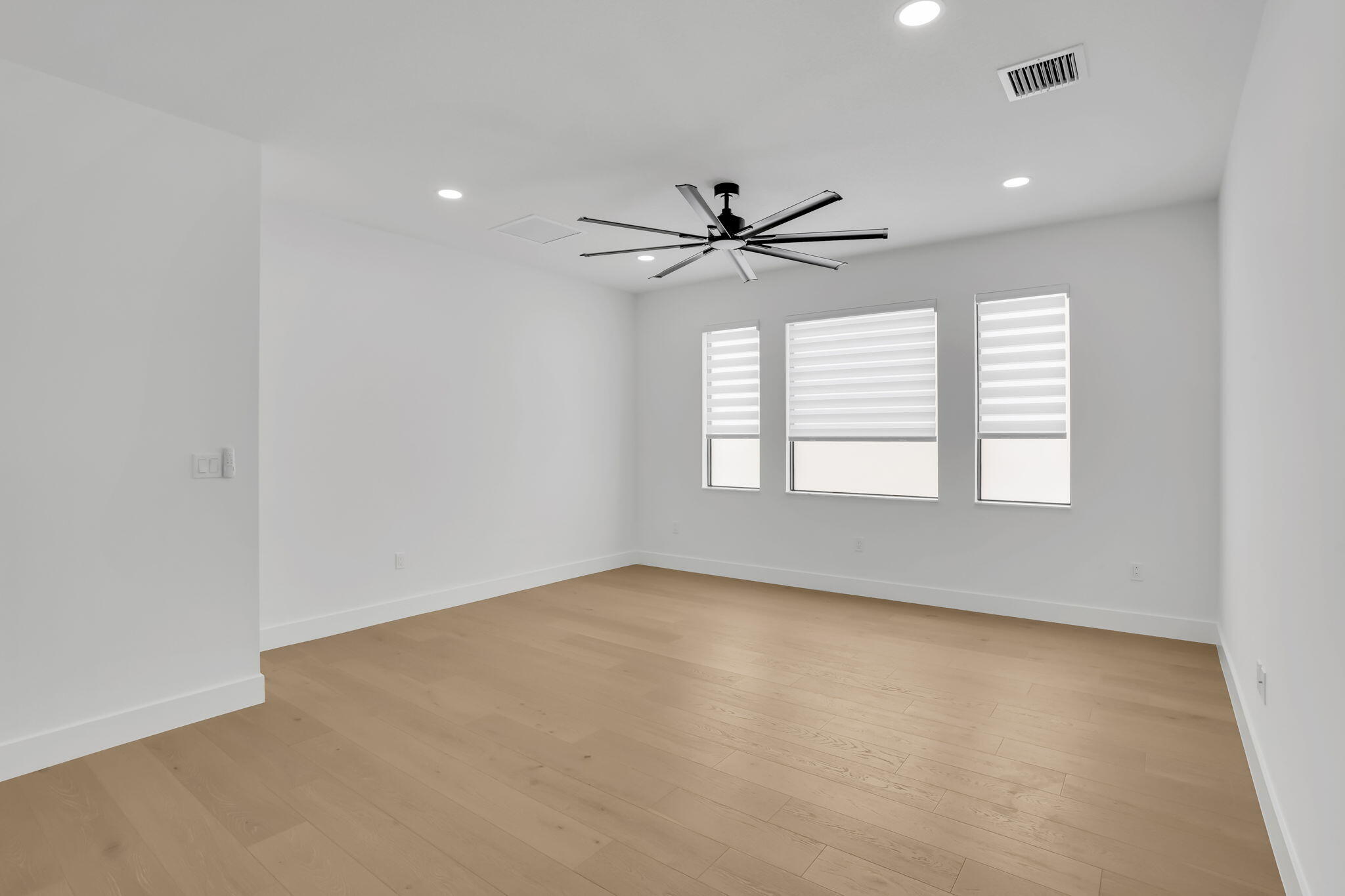 21049 Violet Flds Way Boca Raton, FL 33434 - Photo 19 of 54 an empty room with windows and ceiling fan