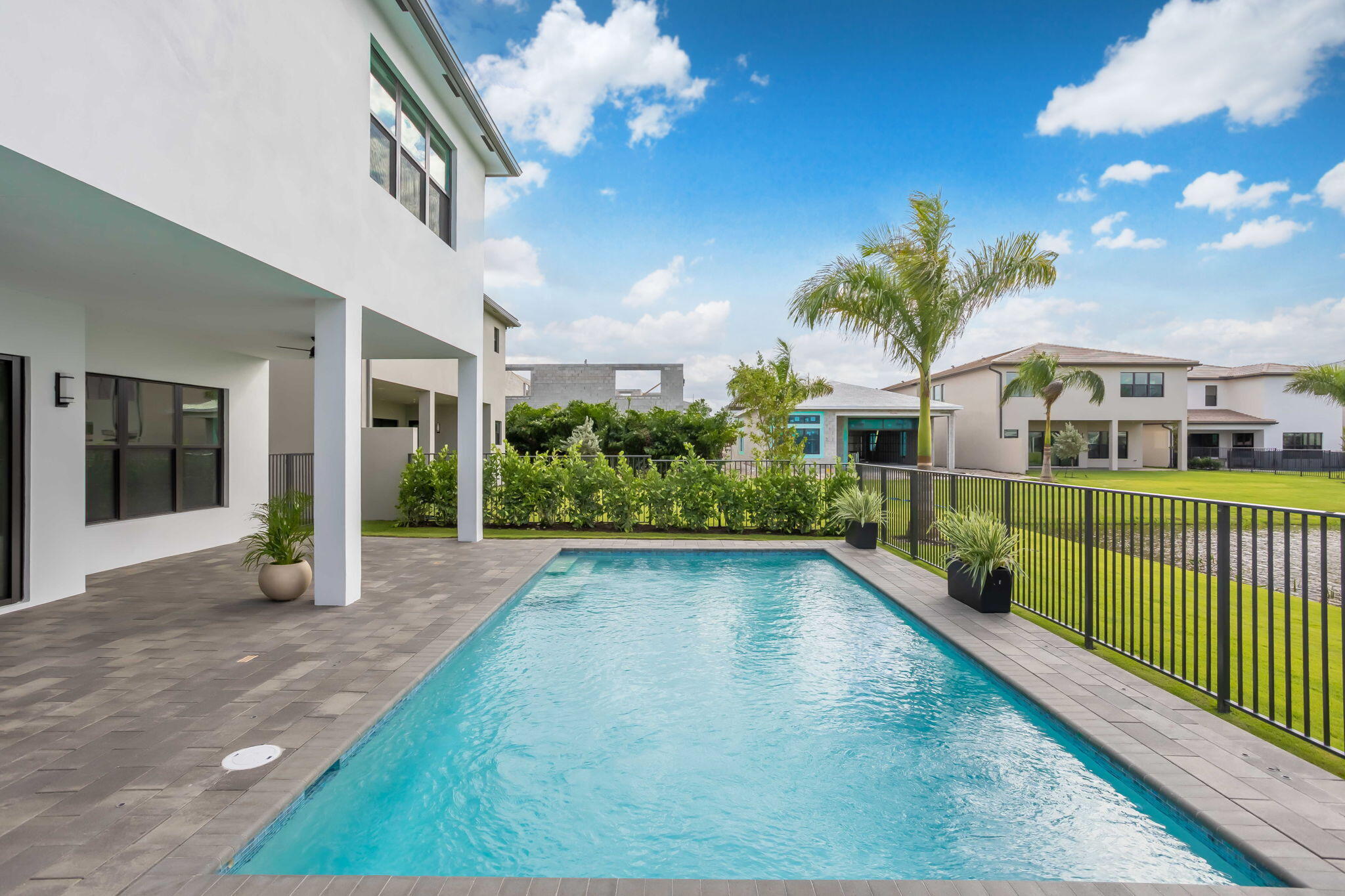 21049 Violet Flds Way Boca Raton, FL 33434 - Photo 24 of 54 a view of an house with backyard and garden