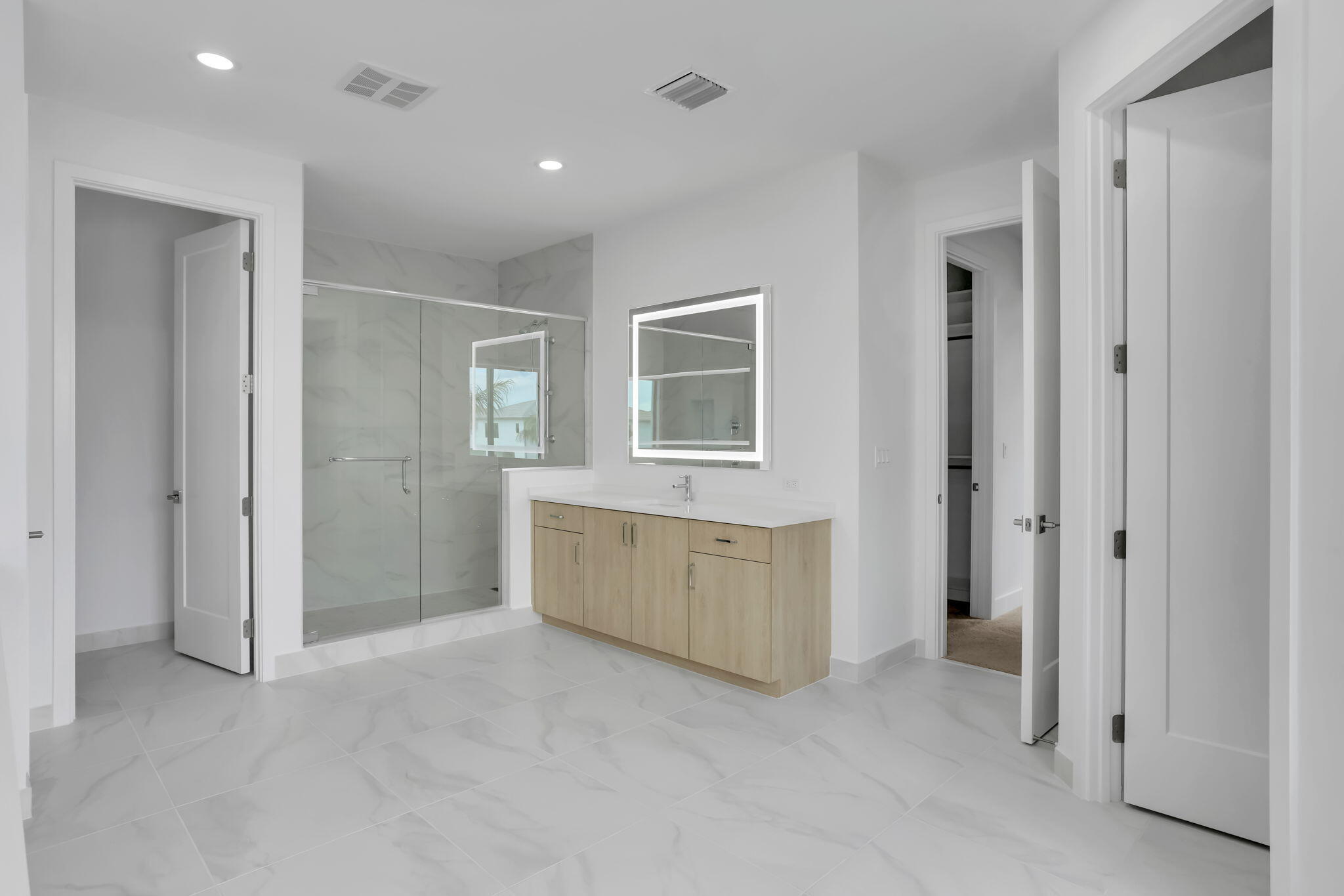 21049 Violet Flds Way Boca Raton, FL 33434 - Photo 32 of 54 a view of an empty room with window and cabinet