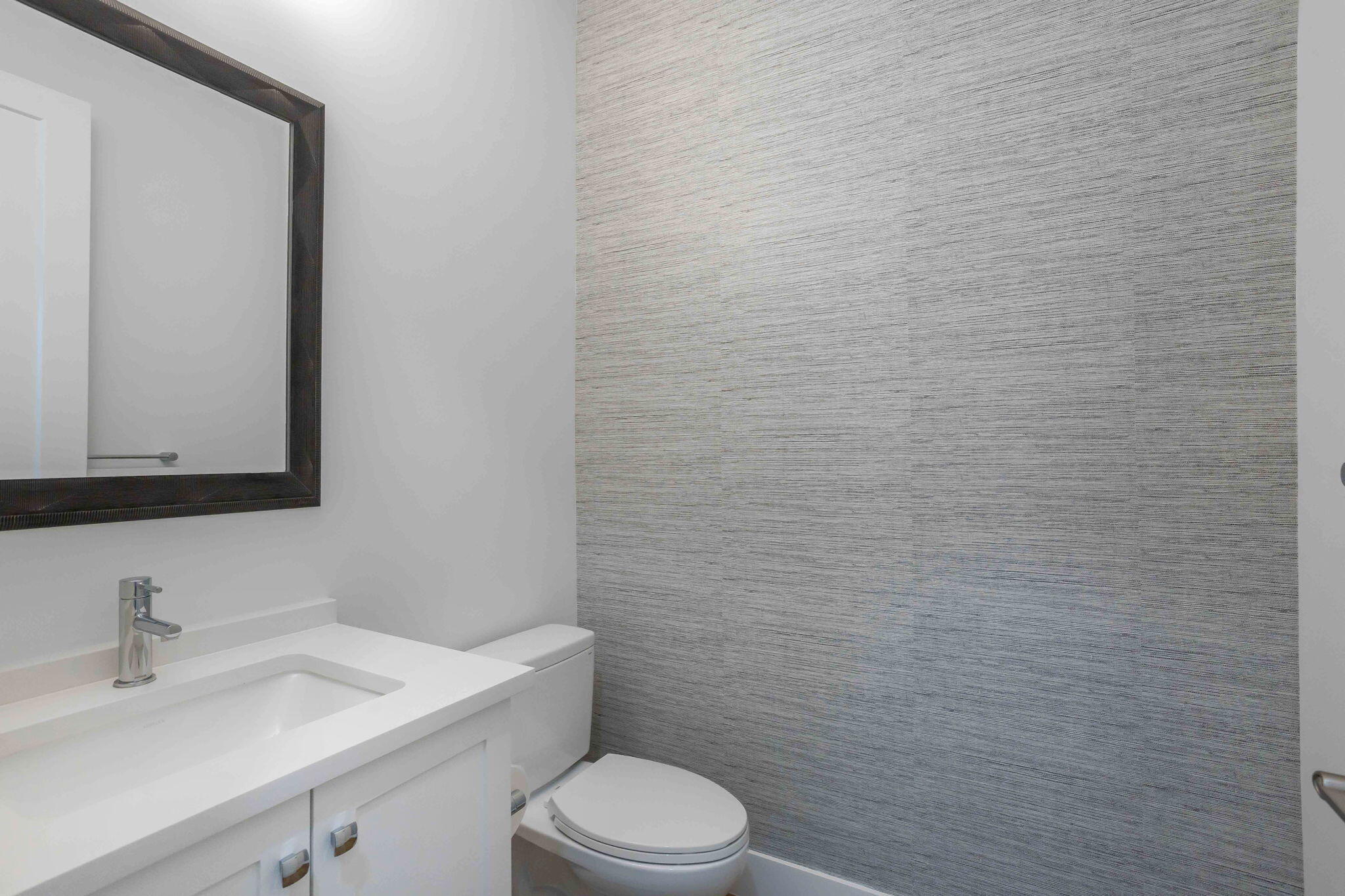 21049 Violet Flds Way Boca Raton, FL 33434 - Photo 44 of 54 a bathroom with a sink a toilet and mirror