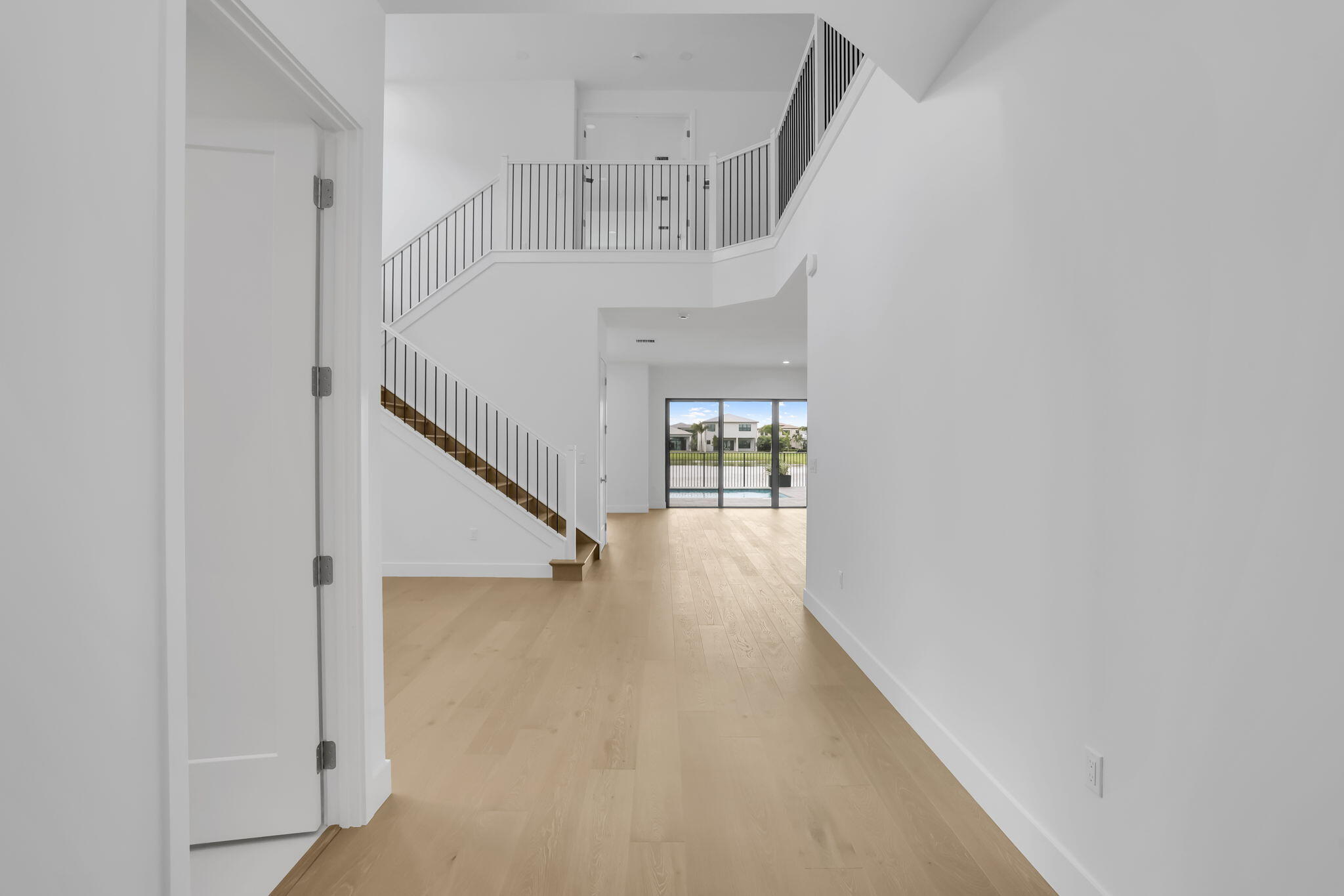 21049 Violet Flds Way Boca Raton, FL 33434 - Photo 5 of 54 a view of entryway and hall with wooden floor