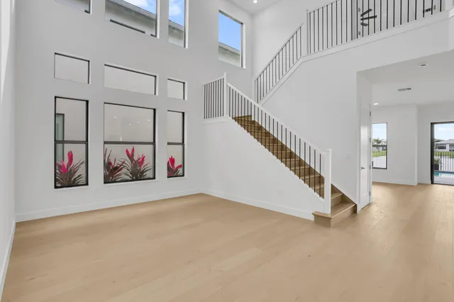 a view of a hallway with staircase