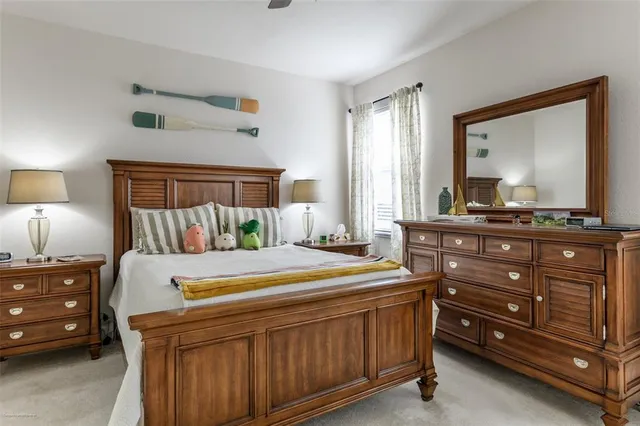 a room with bed and window