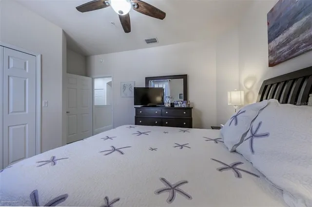 a hallway with a stove top oven a washer and dryer