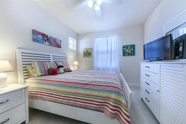 a bedroom with a bed and a cabinets