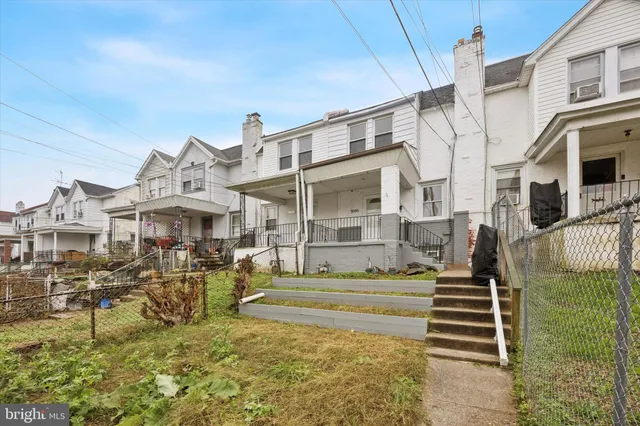 a front view of building with outdoor space