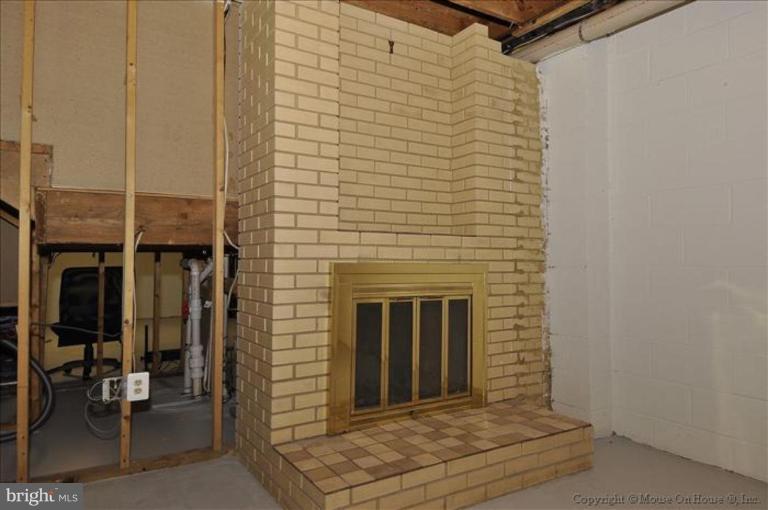 4810 Damascus Road Laytonsville, MD 20882 - Photo 15 of 30 Brick Fireplace in Basement
