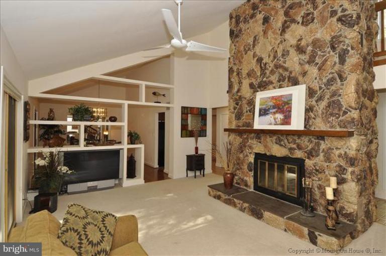 4810 Damascus Road Laytonsville, MD 20882 - Photo 8 of 30 Living Room with 2-story Stone Fireplace
