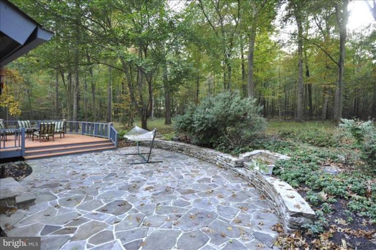 4810 Damascus Road Laytonsville, MD 20882 - Photo 9 of 30 Huge stone Patio adjacent to large Deck