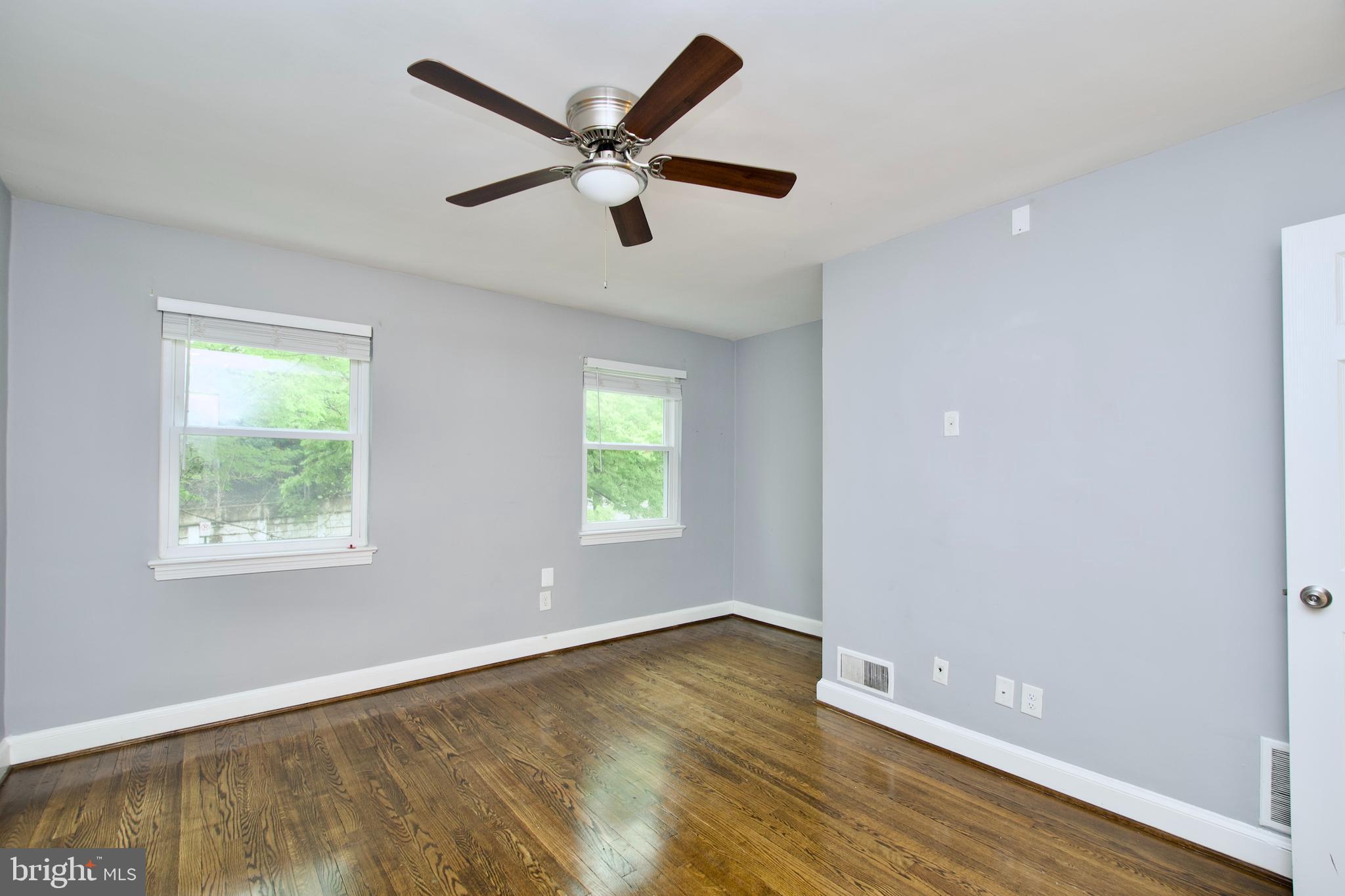 1365 Talbert Terrace Southeast Washington, DC 20020 - Photo 16 of 29 a view of a big room with wooden floor and windows
