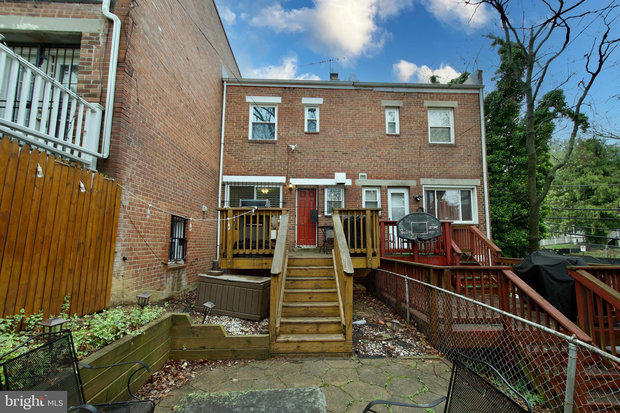 1365 Talbert Terrace Southeast Washington, DC 20020 - Photo 23 of 29 a front view of a house with a yard