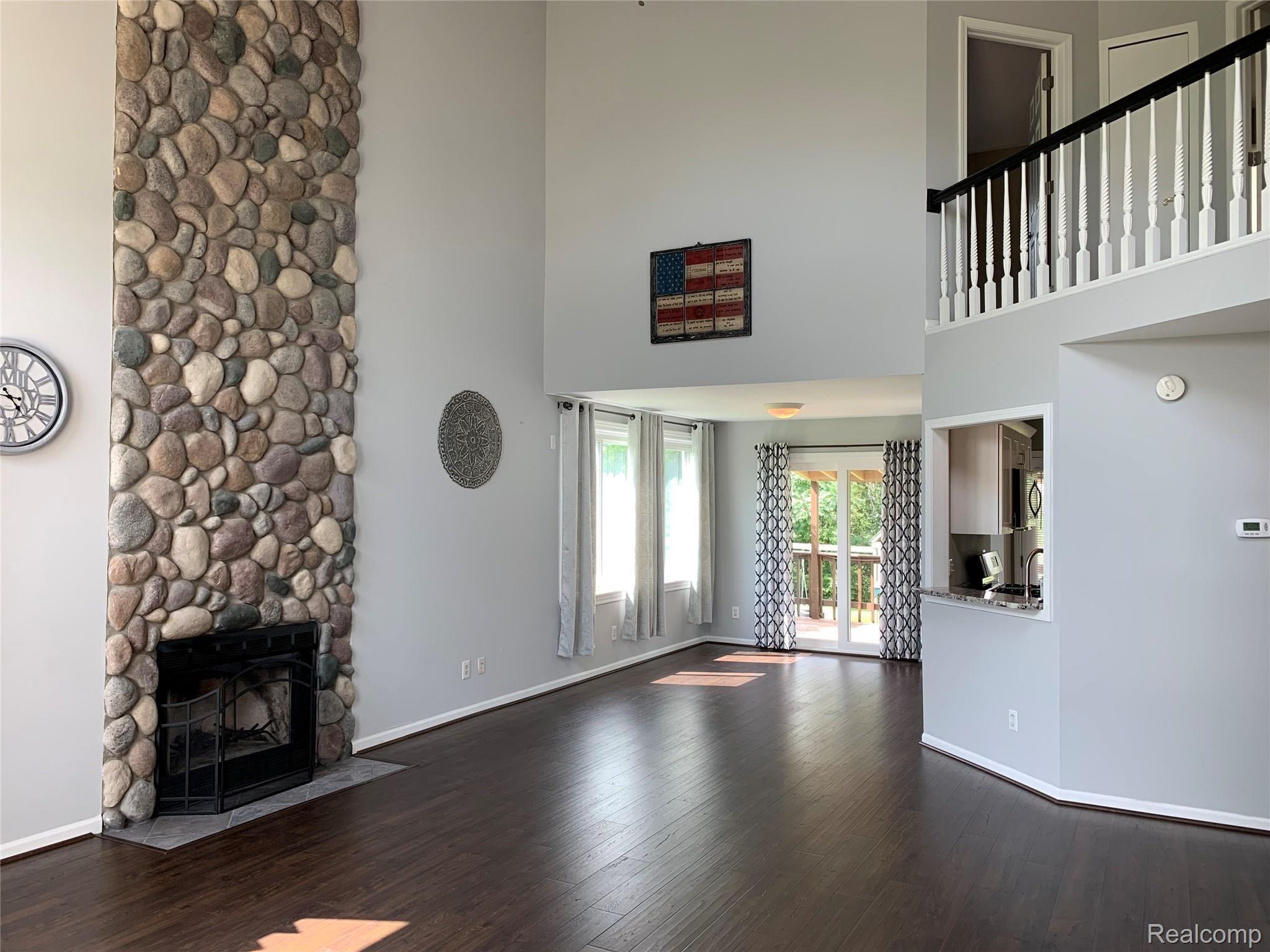 57260 12 Mile Road New Hudson, MI 48165 - Photo 7 of 22 Great room.jpg