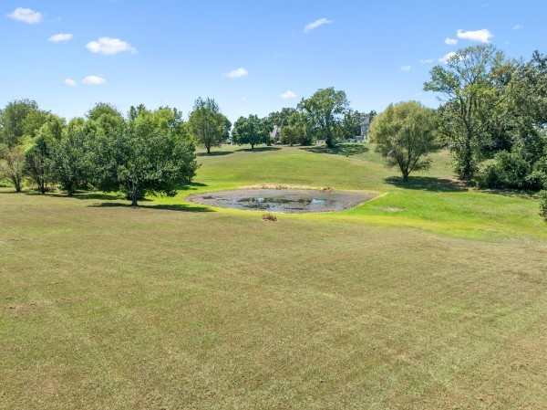 0 Creighton Lane Lebanon, TN 37087 - Photo 8 of 18 a view of a large swimming pool with an outdoor space and seating area