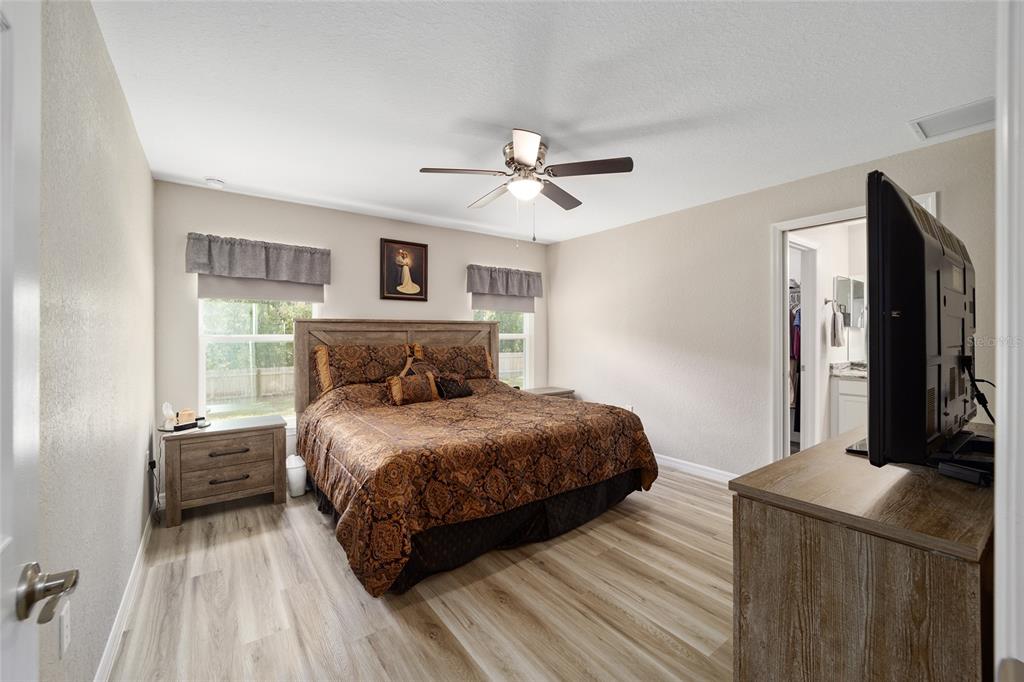 8821 Southwest 129th Terrace Road Dunnellon, FL 34432 - Photo 25 of 67 Primary Bedroom