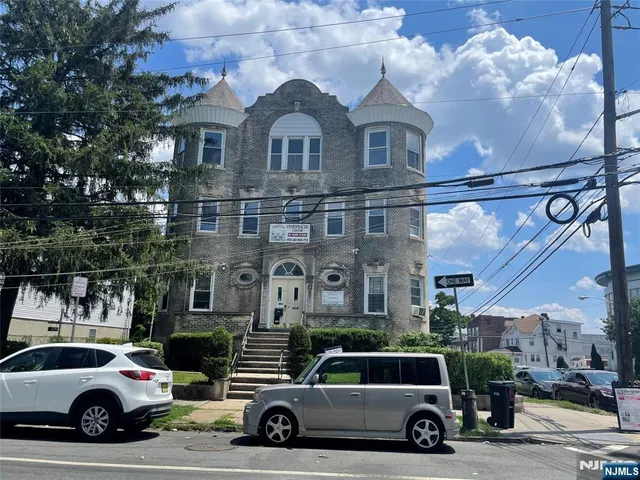 a car parked in front of a building