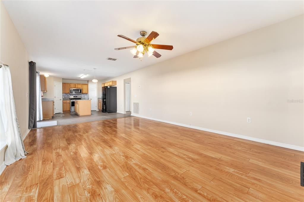 2661 Northeast 42nd Road Ocala, FL 34470 - Photo 23 of 74 a view of empty room with wooden floor